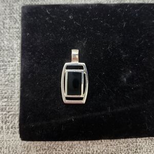 Elegant Silver and Black Pendant